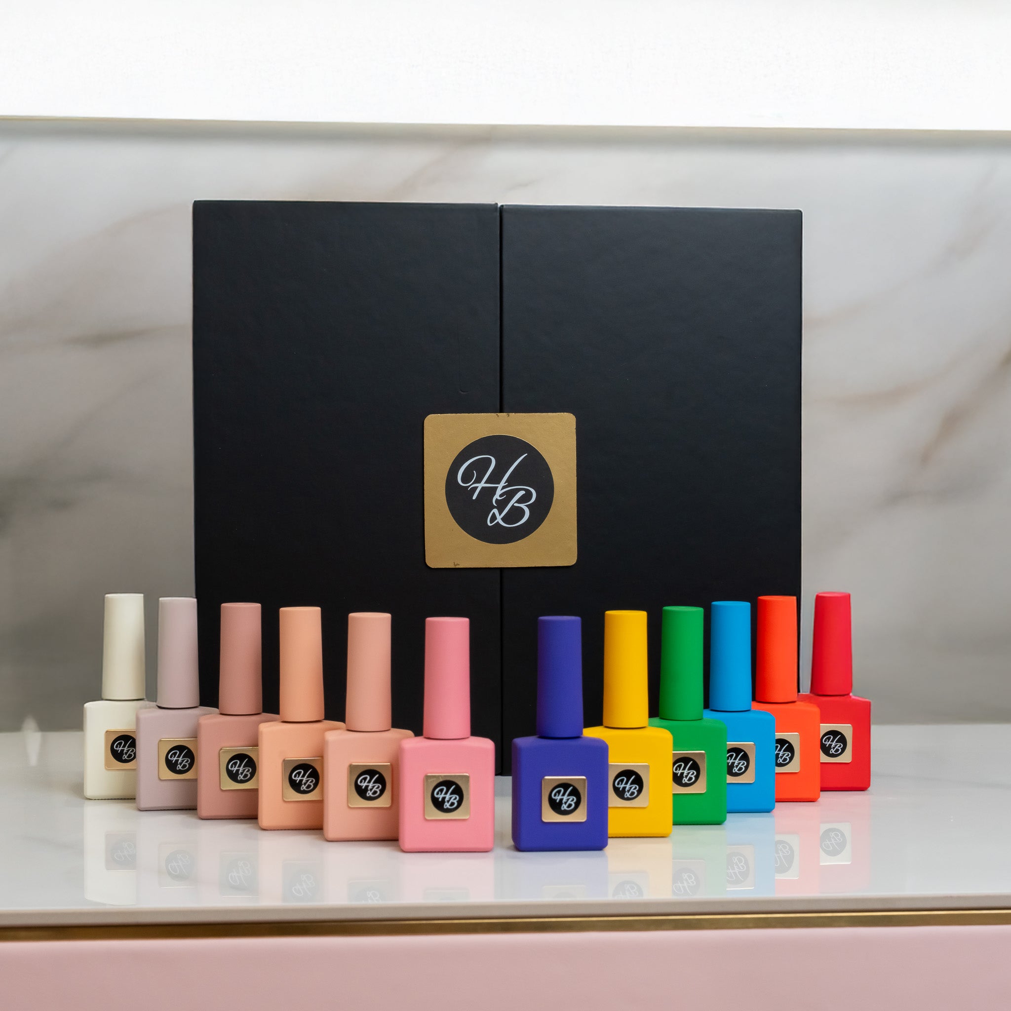 Blush & Bold Collection by Hey Beautiful – 12-piece gel polish set featuring nude and rainbow shades
