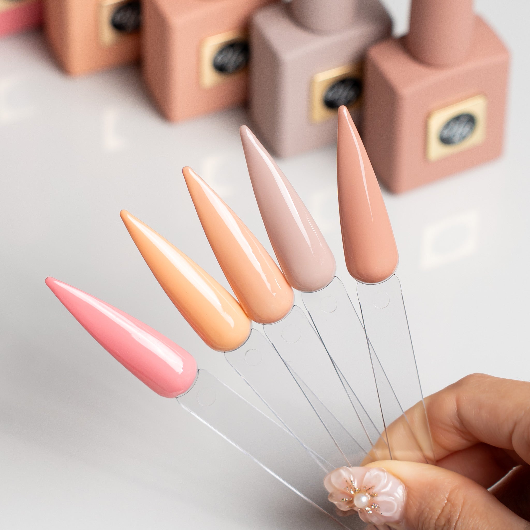 Swatch display of Hey Beautiful Barely Blushed HEMA-Free gel collection – soft pink and nude tones