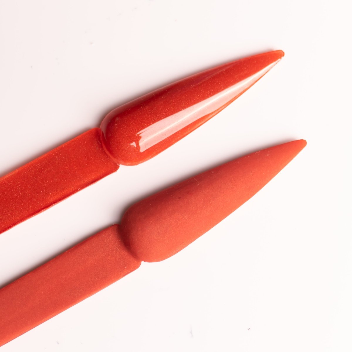 Side-by-side comparison of Texas Sunset Acrylic Powder in both matte and glossy finishes on nails, highlighting the versatility of the burnt orange shade with shimmer.