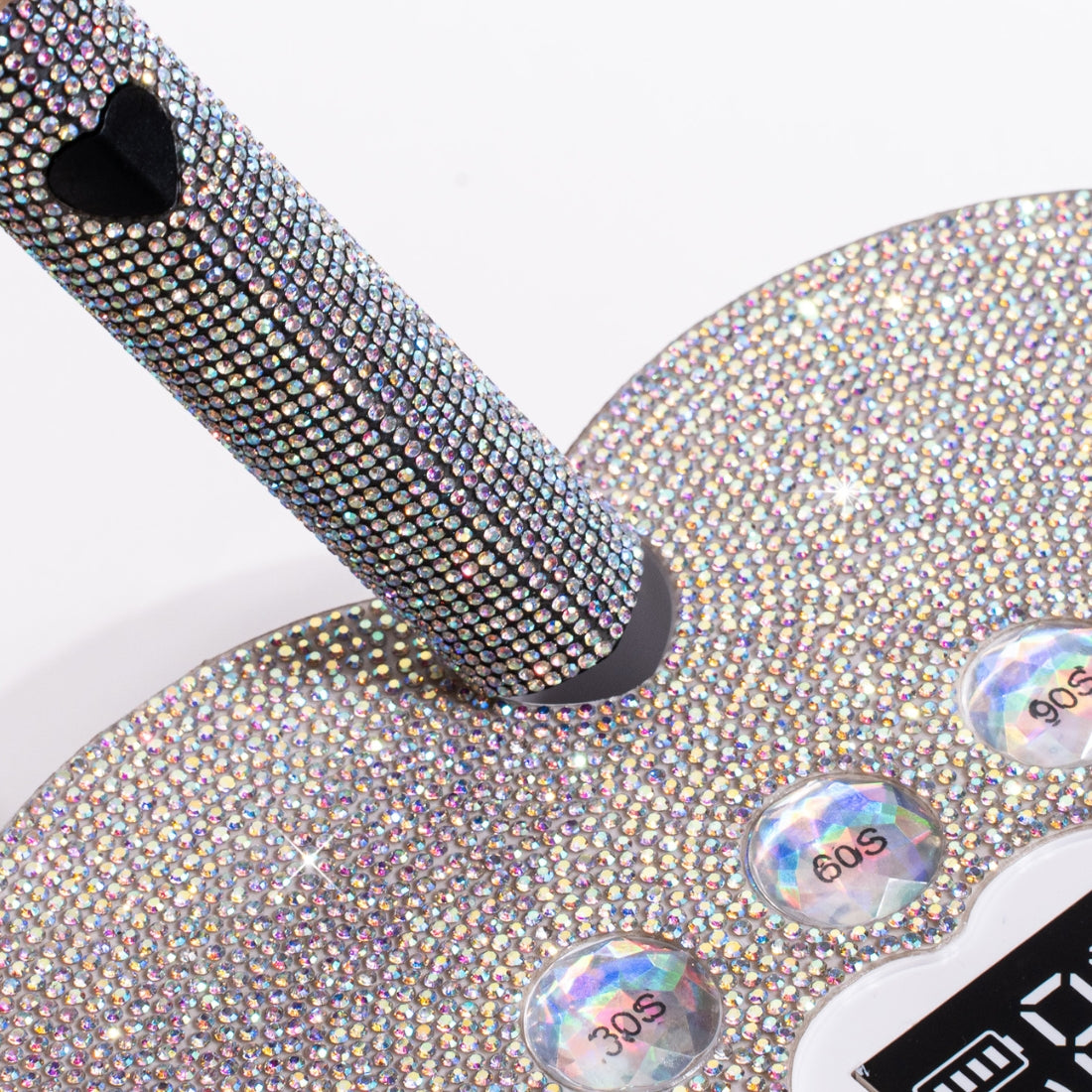 Handheld UV/LED curing light wrapped in Crystal AB crystals