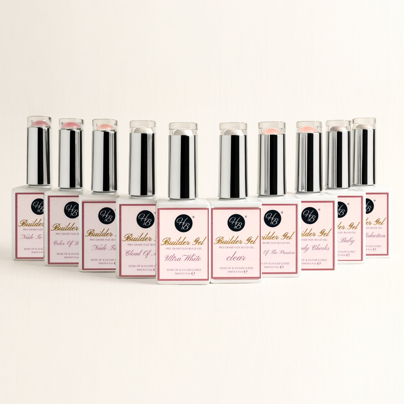 Row of builder gel bottles with various colors on a beige background